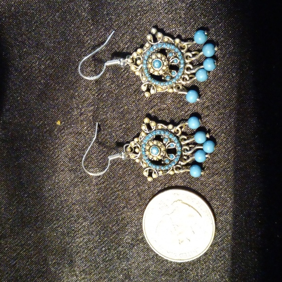 Beautiful turquoise color beads all over these earrings. Give off Navajo vibe. - Picture 3 of 3